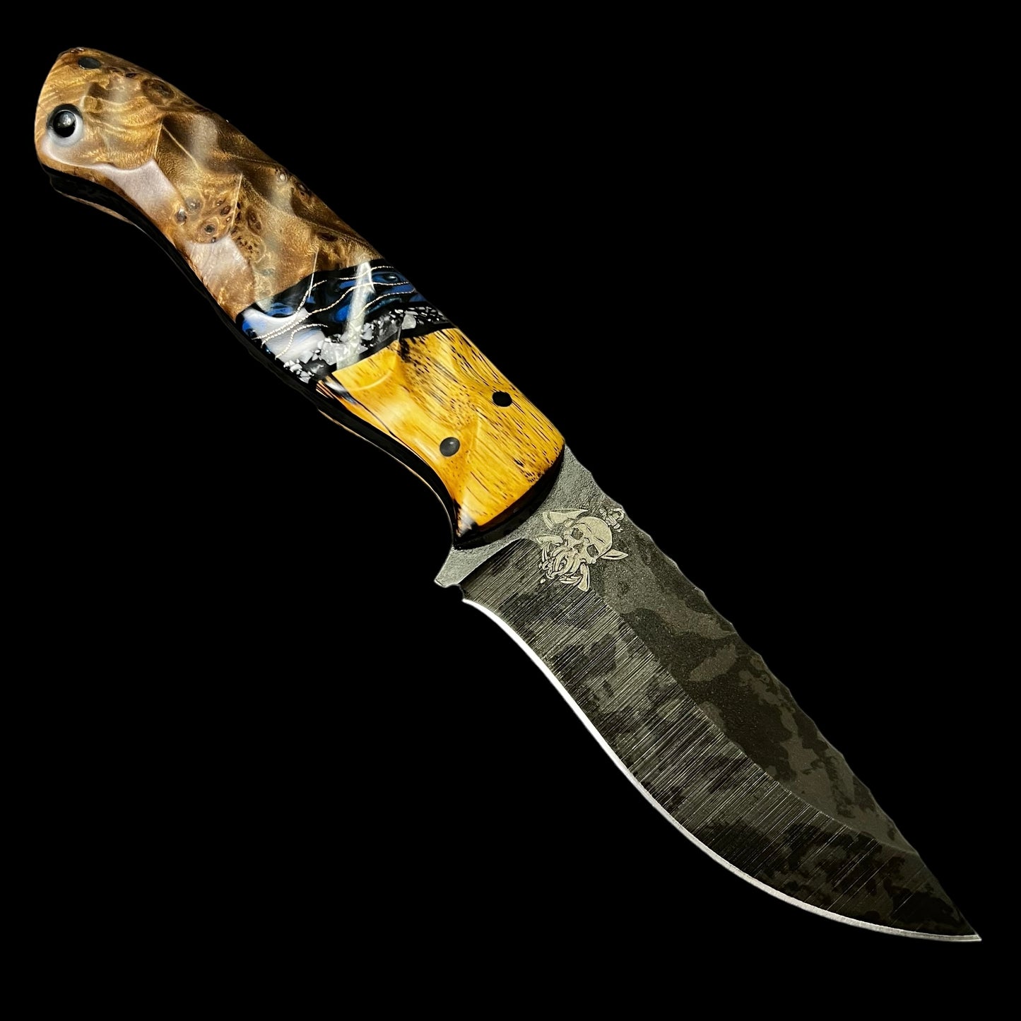 Skinner- Spalted Mahogany/ Black and White Resin/ Black G10/ Copper Webbed Blue Resin/ Spalted Maple. Pins- Carbon Fiber.